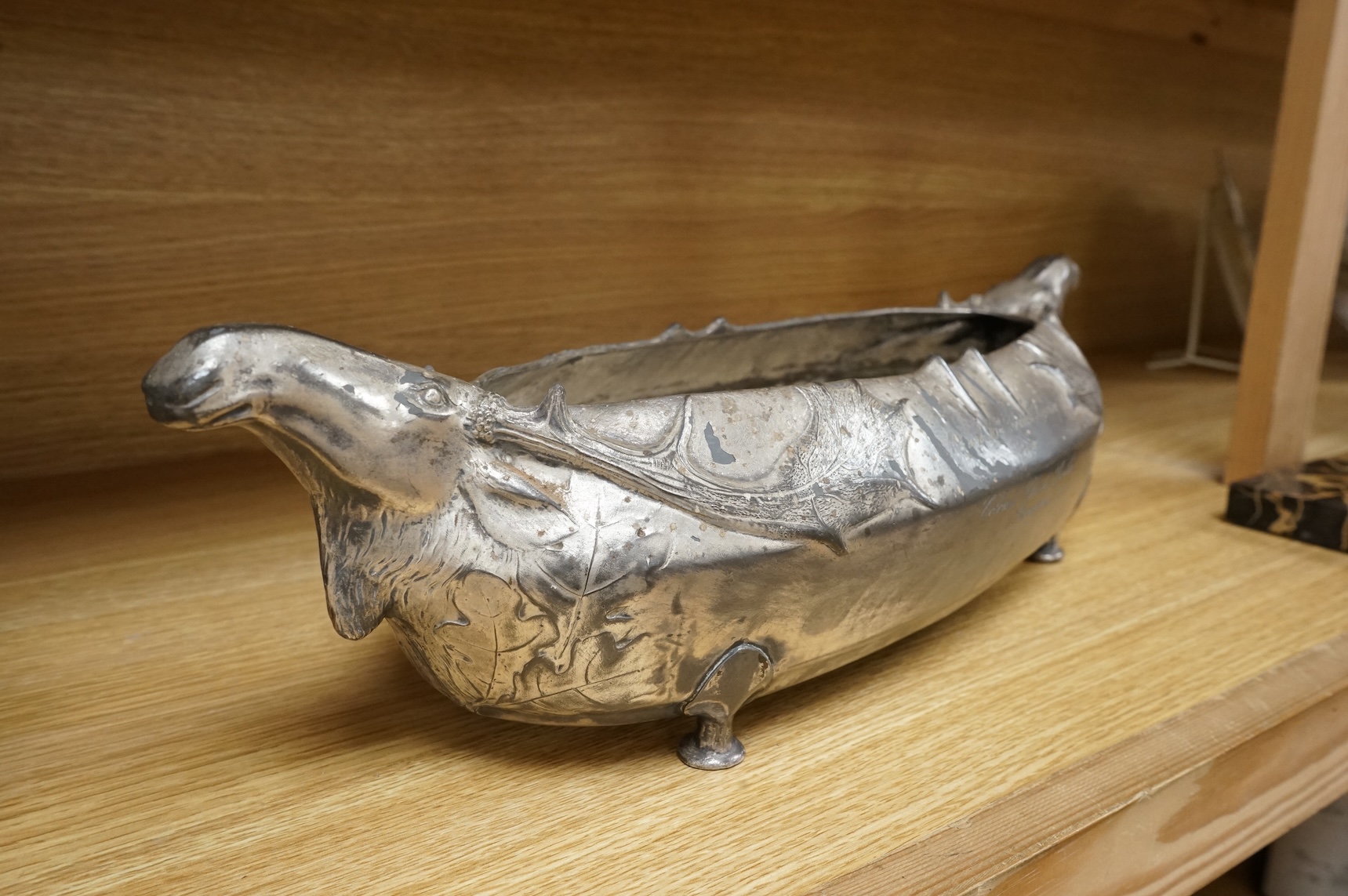 A Kayserzinn Versilbert ‘moose’ centrepiece with presentation inscription dated 1907, 47cm wide